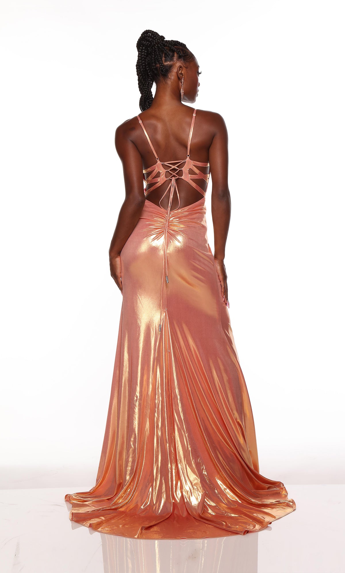Metallic prom dress with a lace up back and train in coral-gold.