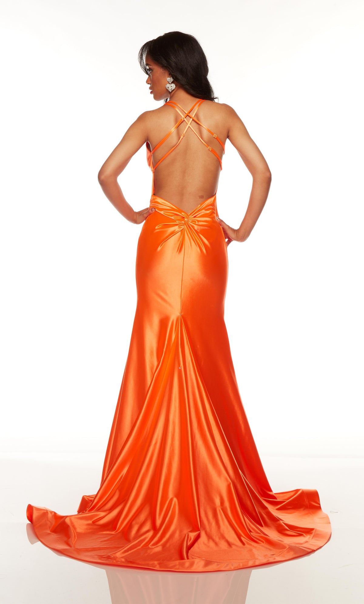 Orange satin gown with a crisscross back and long train.