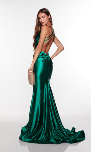 Green satin gown with a crisscross back and long train.