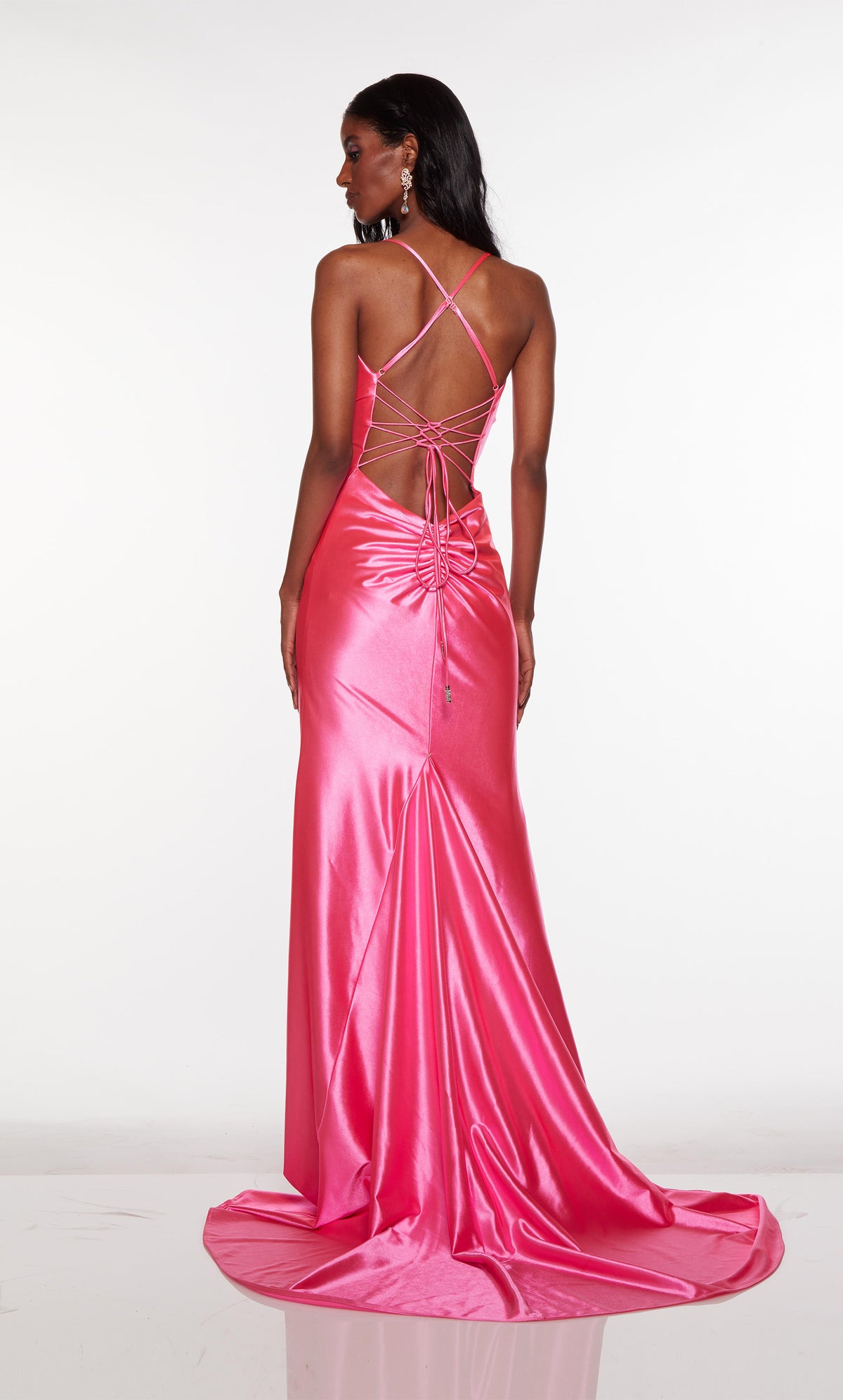 Strappy back satin formal dress with a long train in hot pink.