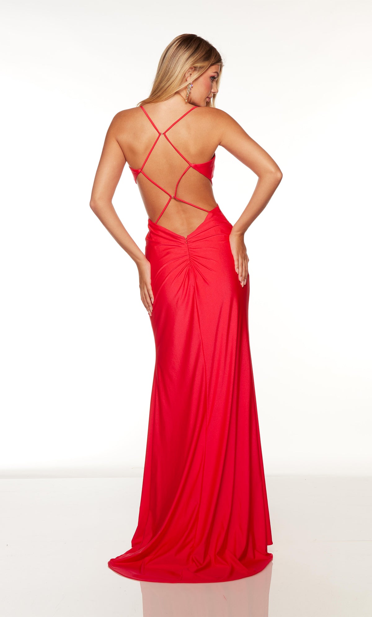 Red prom dress with crisscross back style and train.