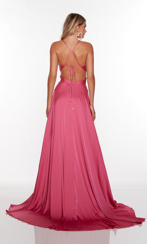 Long flowy hot pink gown with lace up back and train.