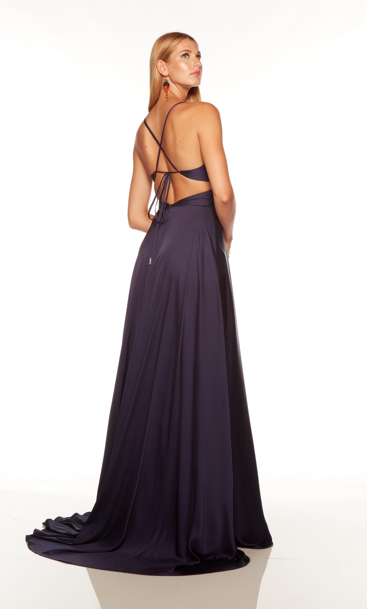 Long flowy A line gown with lace up back and train in midnight blue.