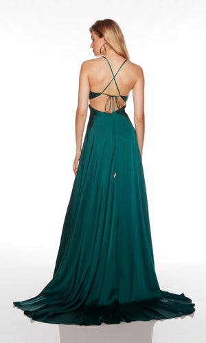 Long flowy A line gown with lace up back and train in pine green.