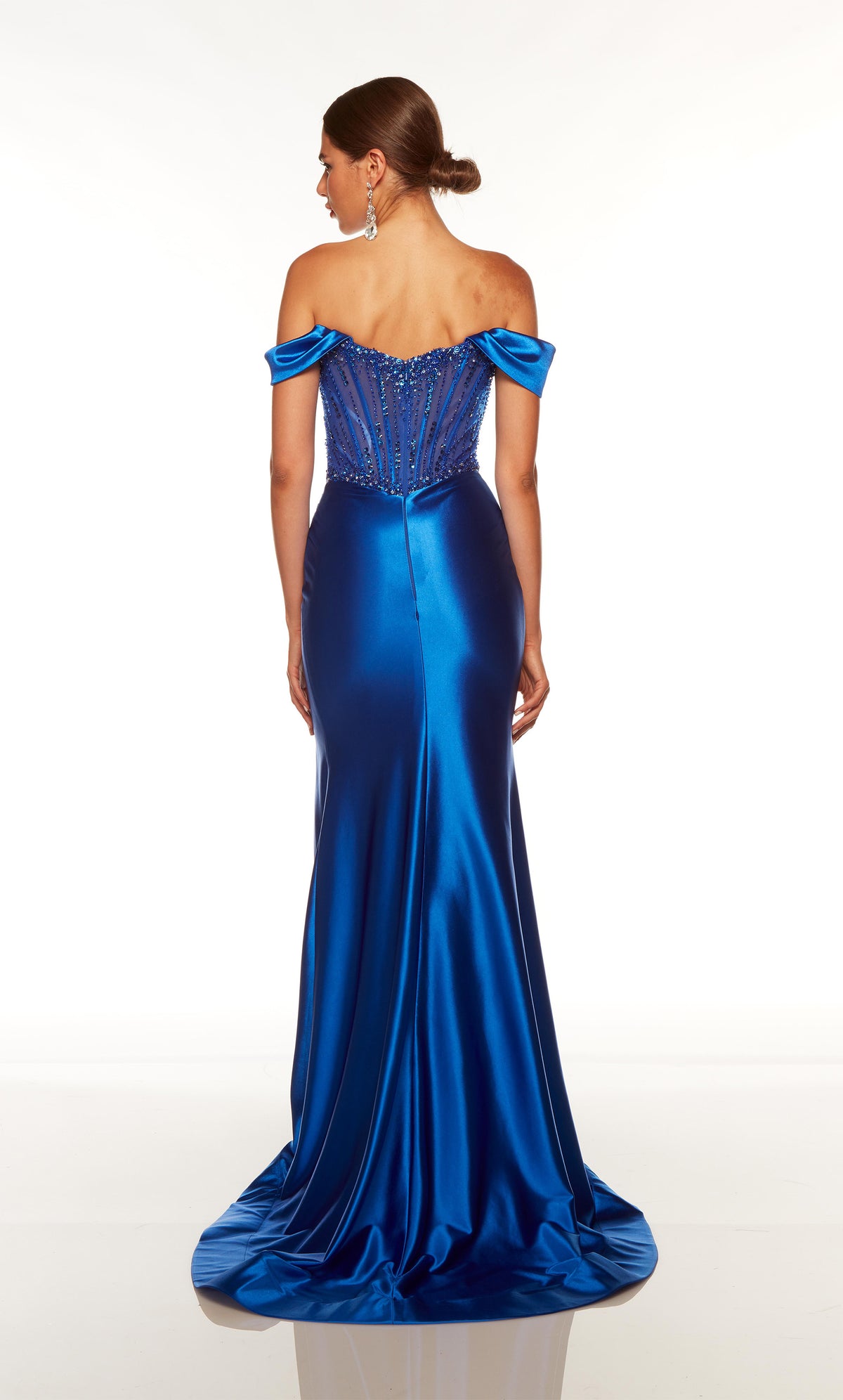 Royal blue corset gown with a sheer embellished bodice, zip up back, and train.