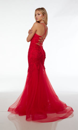 Red mermaid dress with plunging neckline, crisscross lace-up back, and an slight train crafted in tulle and adorned with delicate beaded lace for an elegant and captivating look.