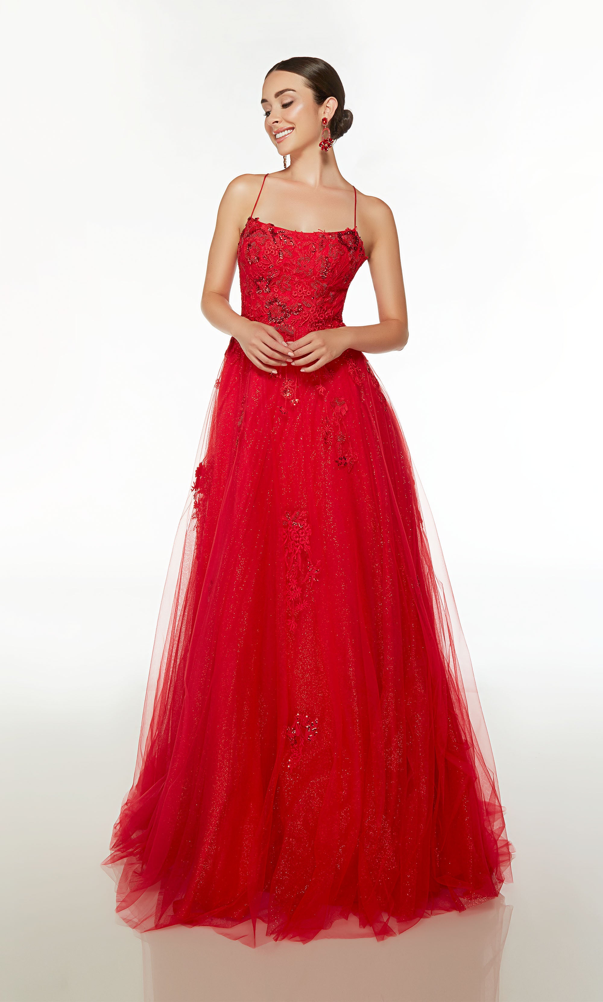 Red prom dress: Scooped neckline, A-line skirt, crisscross lace up back, and train crafted in glitter tulle and adorned with delicate beaded lace.