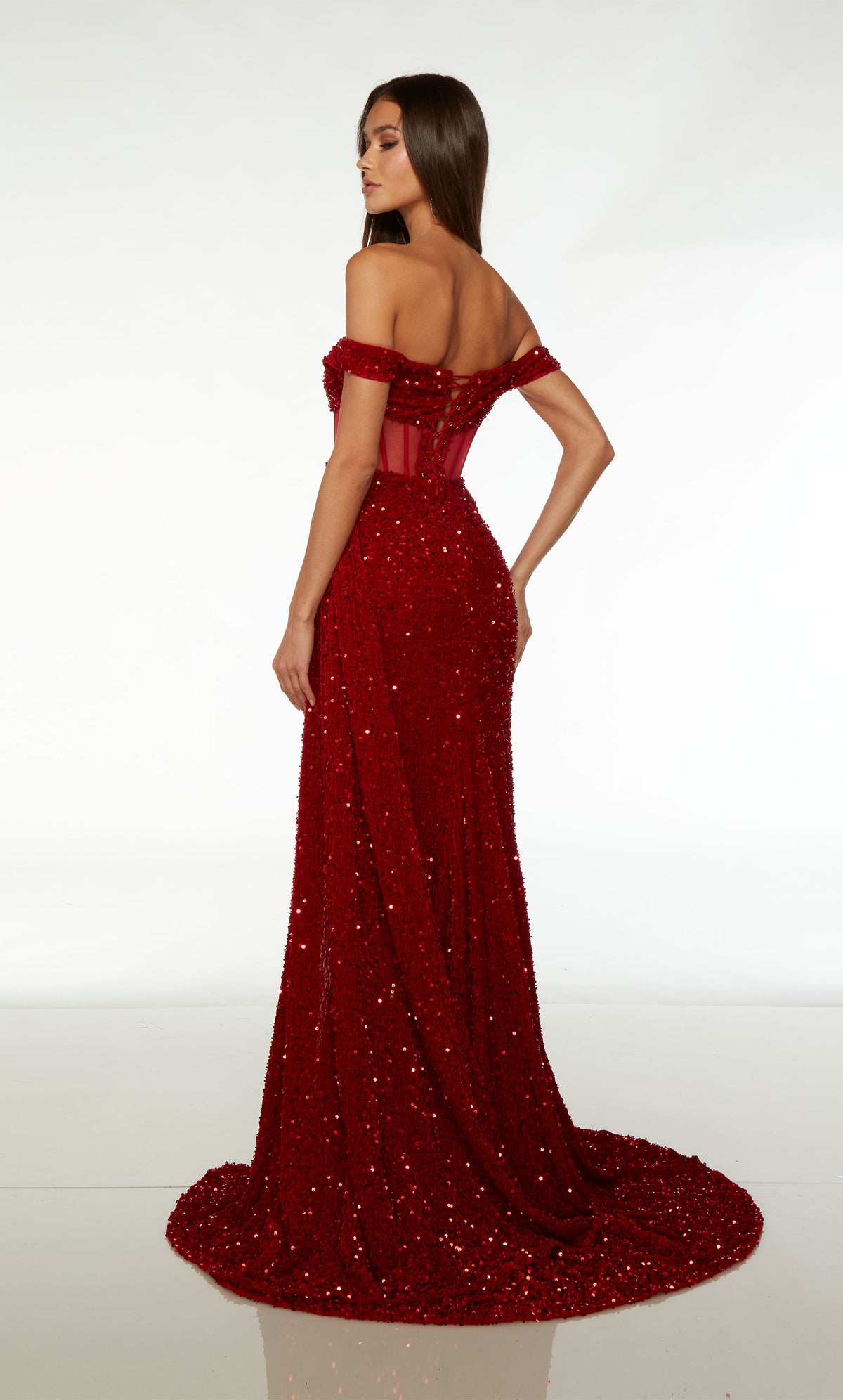Striking red prom dress: Off-the-shoulder sheer corset top, side slit with beaded fringe, train, and detachable side train for an dramatic and glamorous look.