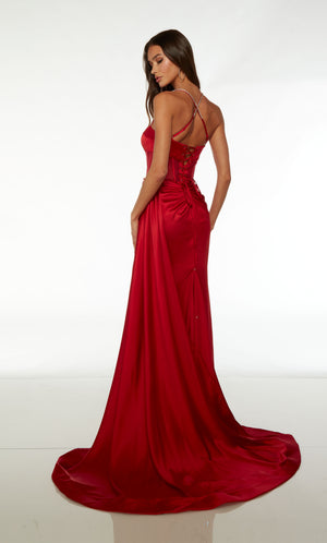 Red satin gown: Plunging sheer corset top, high slit, ruching detail, train, and detachable side train for added drama and flair to the elegant look.