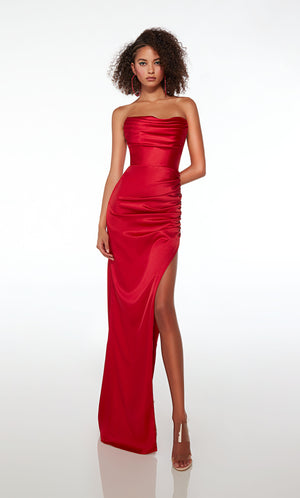 Form-fitting strapless red prom dress with an side slit, ruching, crafted in glamorous satin fabric for an elegant and stylish look.