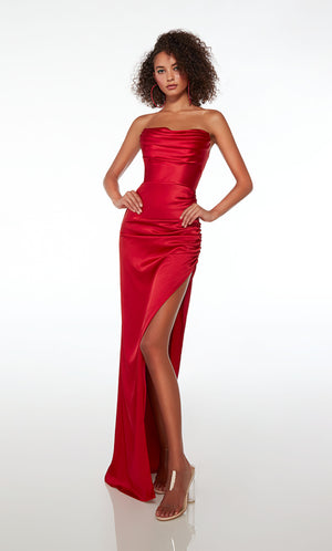 Form-fitting strapless red prom dress with an side slit, ruching, crafted in glamorous satin fabric for an elegant and stylish look.