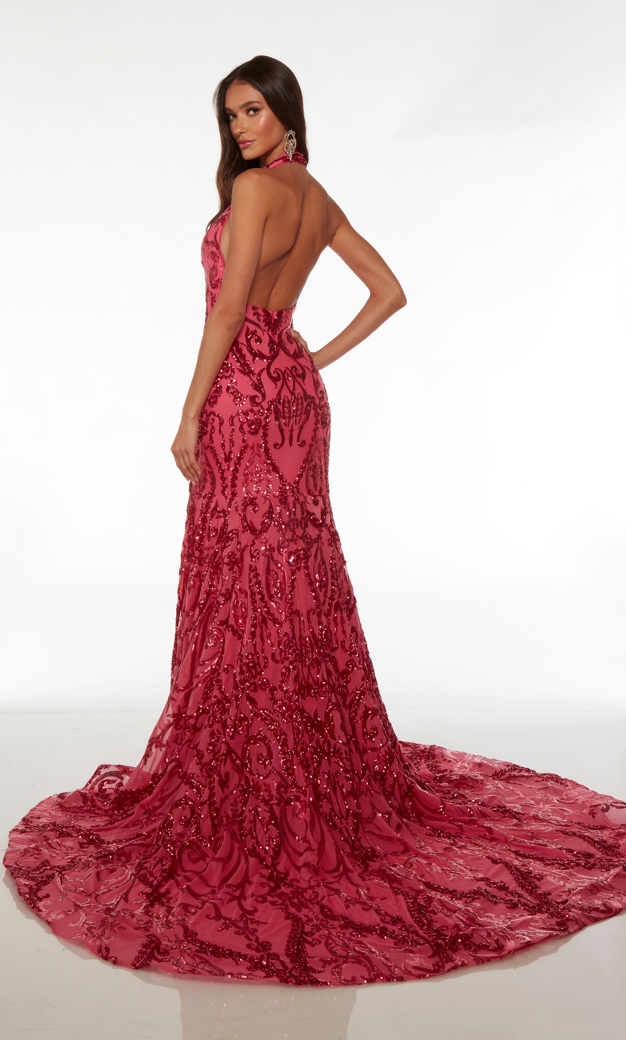 Dazzling mermaid dress in red paisley sequin fabric, featuring an plunging halter neck, open back, and an gracefully long train.