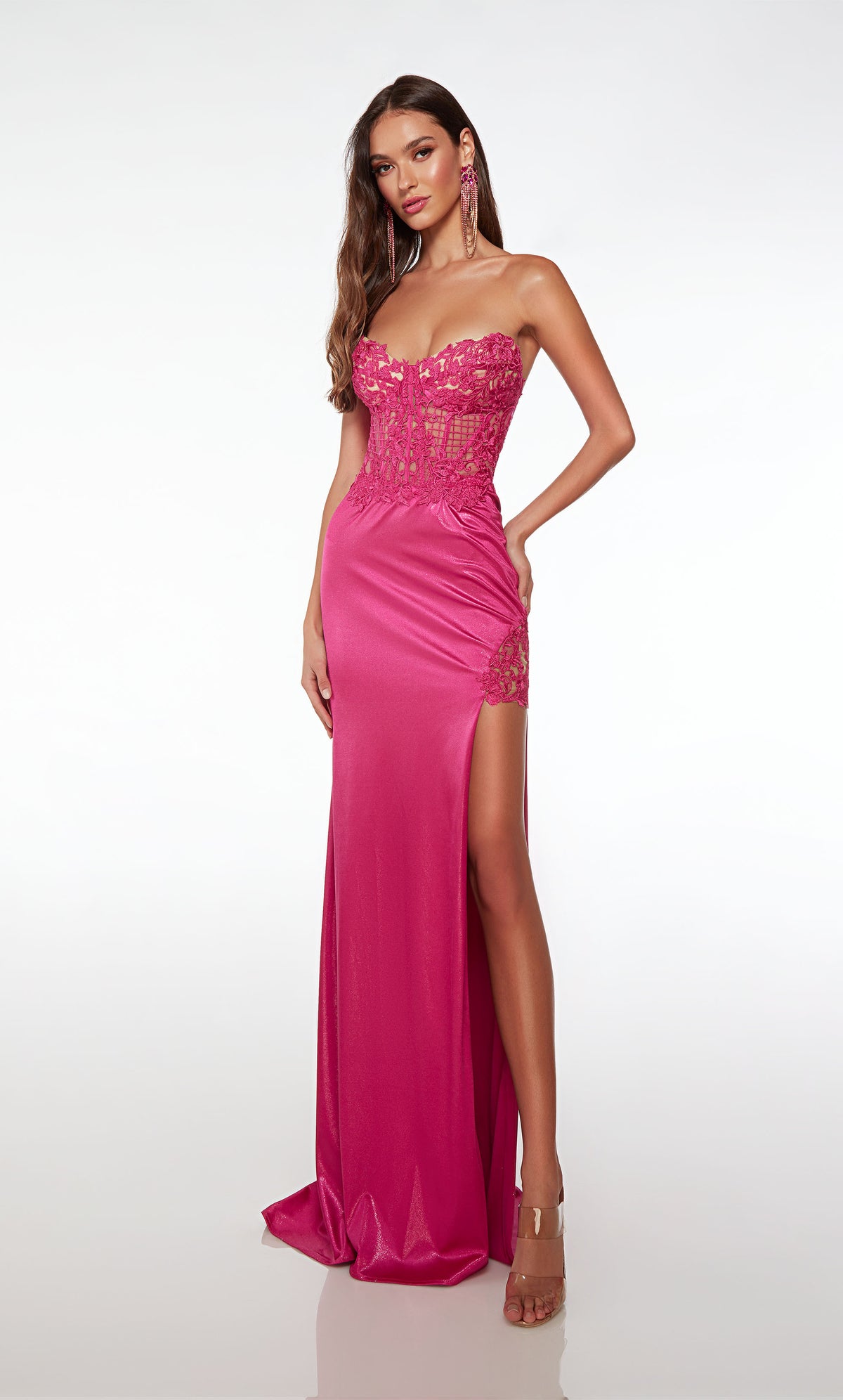 Chic strapless pink sweet 16 dress featuring an lace corset top, high side slit, and an dramatic ruffled detachable skirt for added flair.