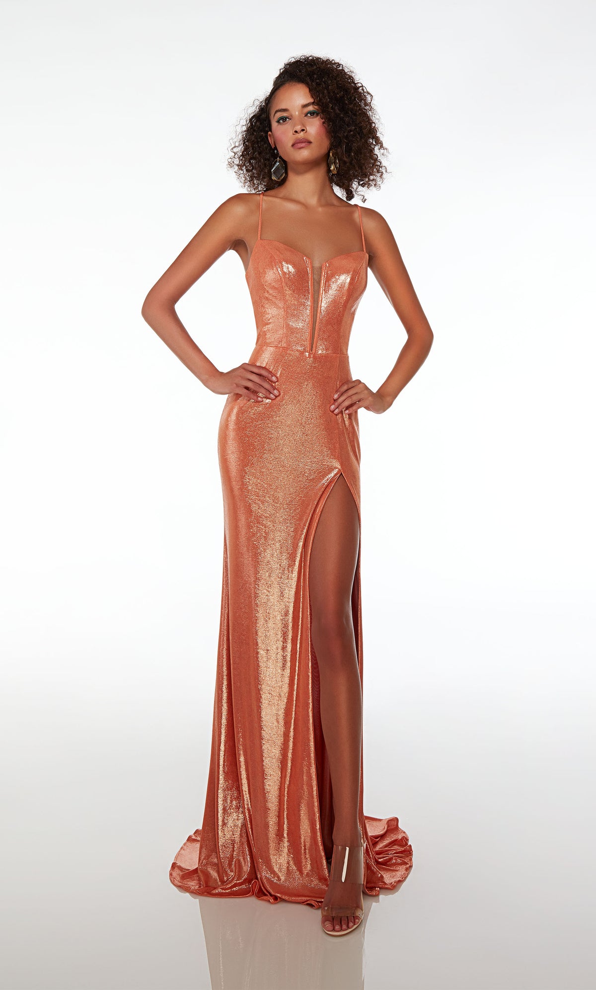 Elegant copper-colored metallic stretch formal dress with an plunging neckline, side slit, lace-up back, and an graceful train for an stylish and sophisticated look.
