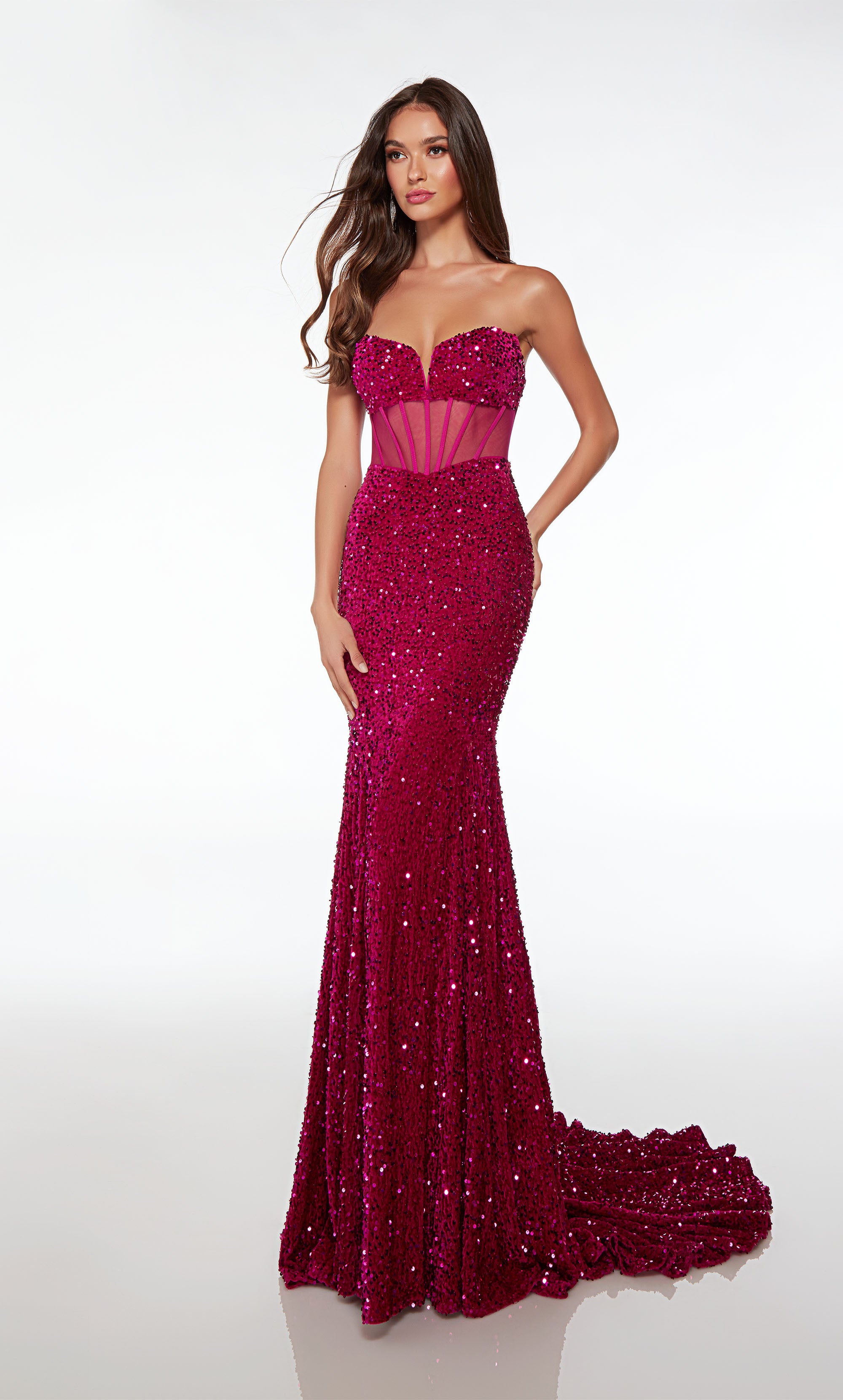 Chic pink sequin gown: strapless sweetheart neckline, sheer corset, fit-and-flare skirt, long train, exuding glamour and sophistication.