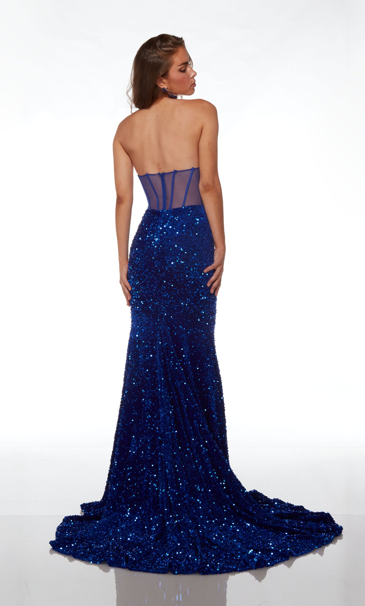 Chic royal blue sequin gown: strapless sweetheart neckline, sheer corset, fit-and-flare skirt, long train, exuding glamour and sophistication.