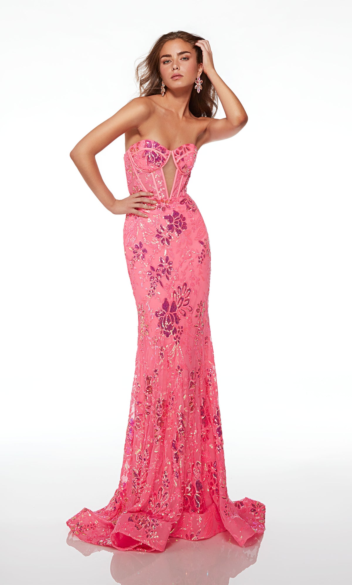 Strapless neon pink prom dress featuring an diamond keyhole corset top, lace-up back, train, and iridescent floral sequin designs for an captivating and elegant look.