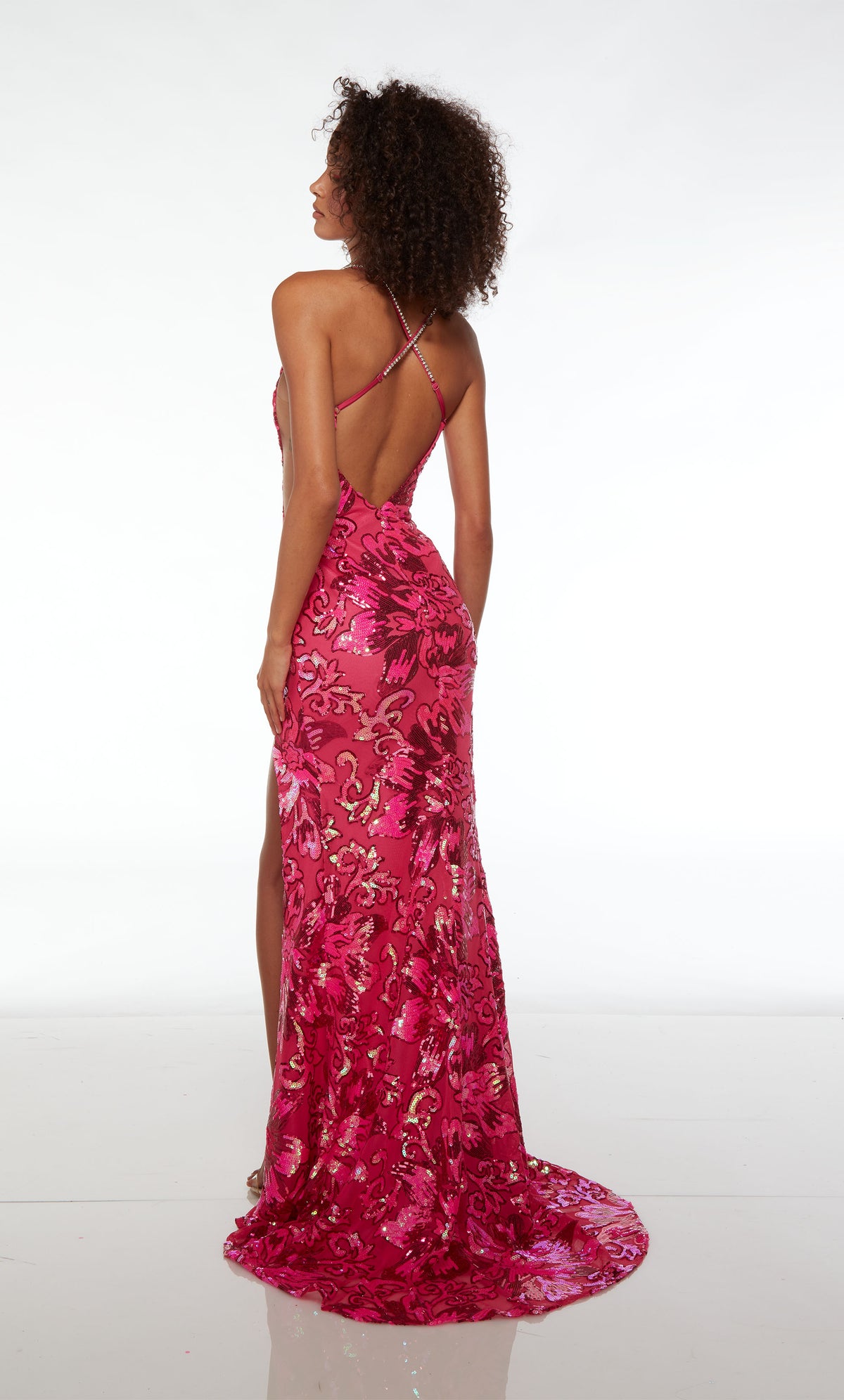 Pink mermaid dress, floral sequins, plunging neckline, high slit, crisscross back, stylish train—an captivating and glamorous ensemble.