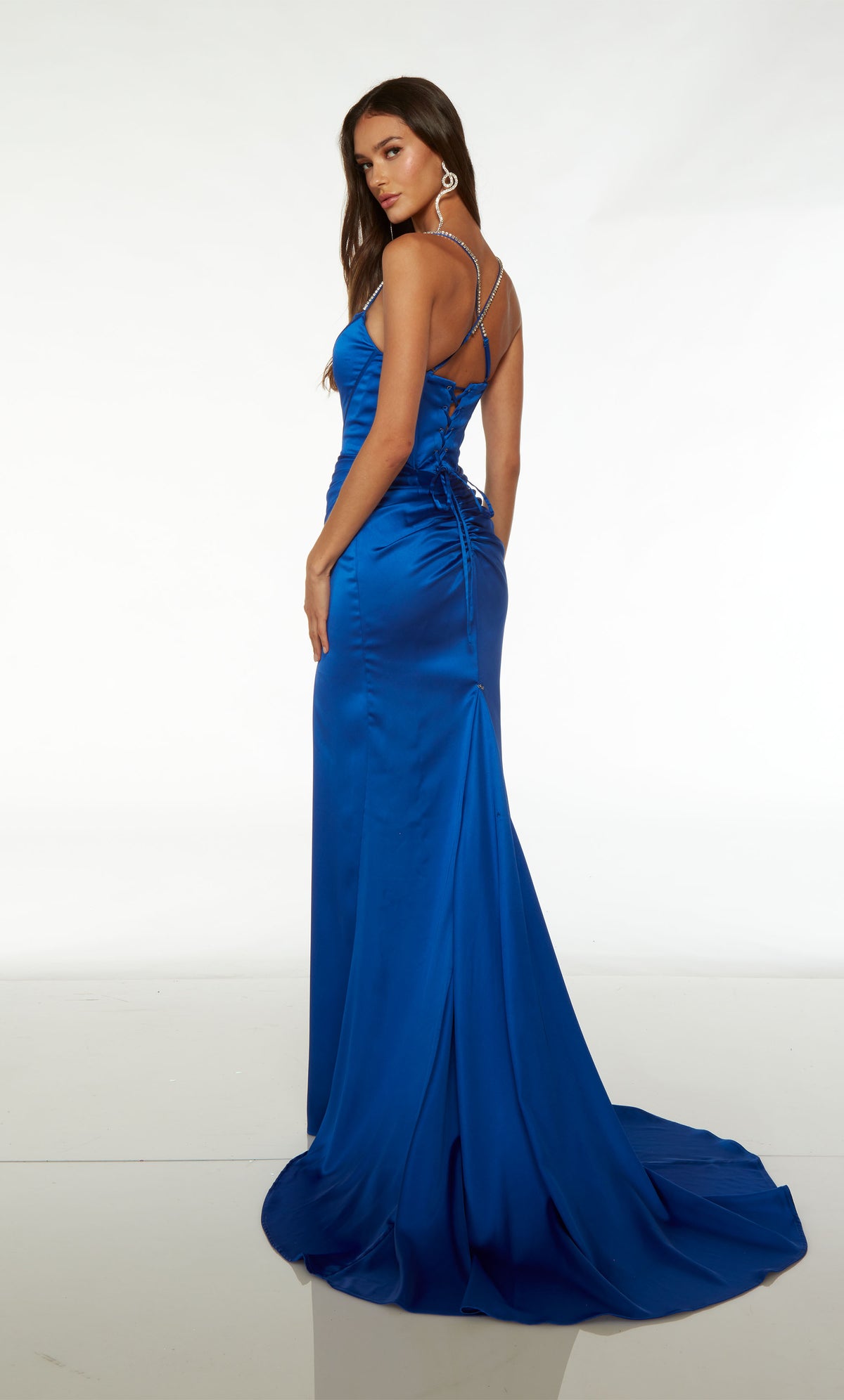Blue satin corset gown with square neckline, gathered waist, high slit, jeweled straps, lace-up back, and detachable side train for added flair.