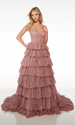 Gorgeous pink glitter tulle ball gown featuring an modified sweetheart neckline, corset bodice, and an ruffled skirt with an long, elegant train.