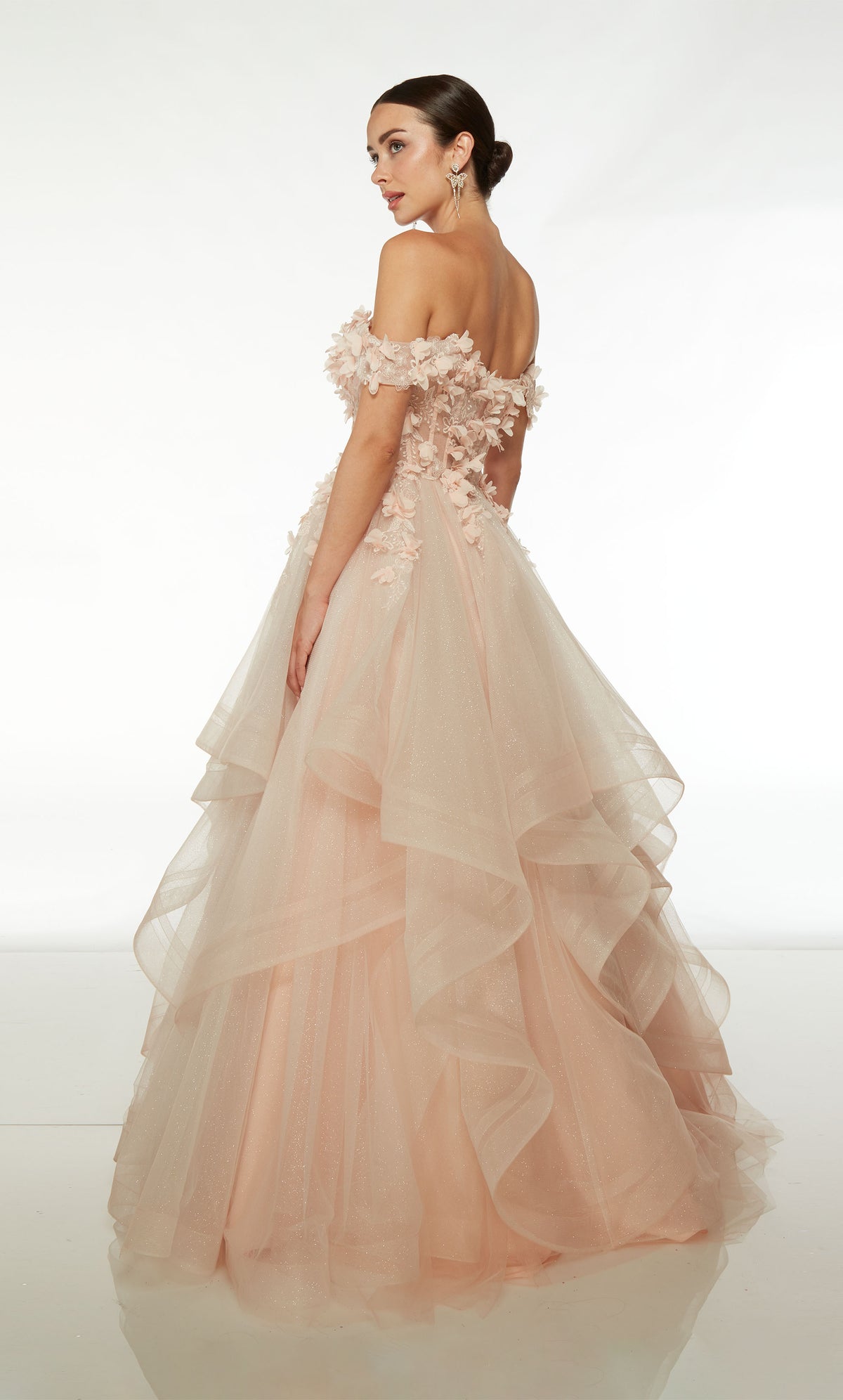 Pink glitter tulle off-the-shoulder corset ball gown with detachable sleeves, sheer 3D flower embellished bodice, and an ruffled tulle skirt for an whimsical vibe.