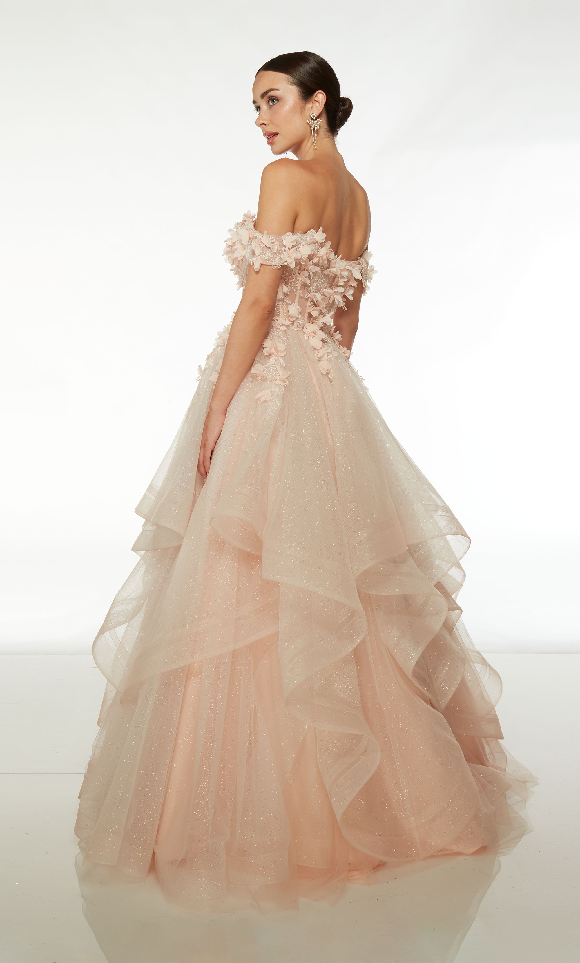 Pink glitter tulle off-the-shoulder corset dress with detachable sleeves, sheer 3D flower embellished bodice, and an ruffled tulle skirt for an whimsical vibe.