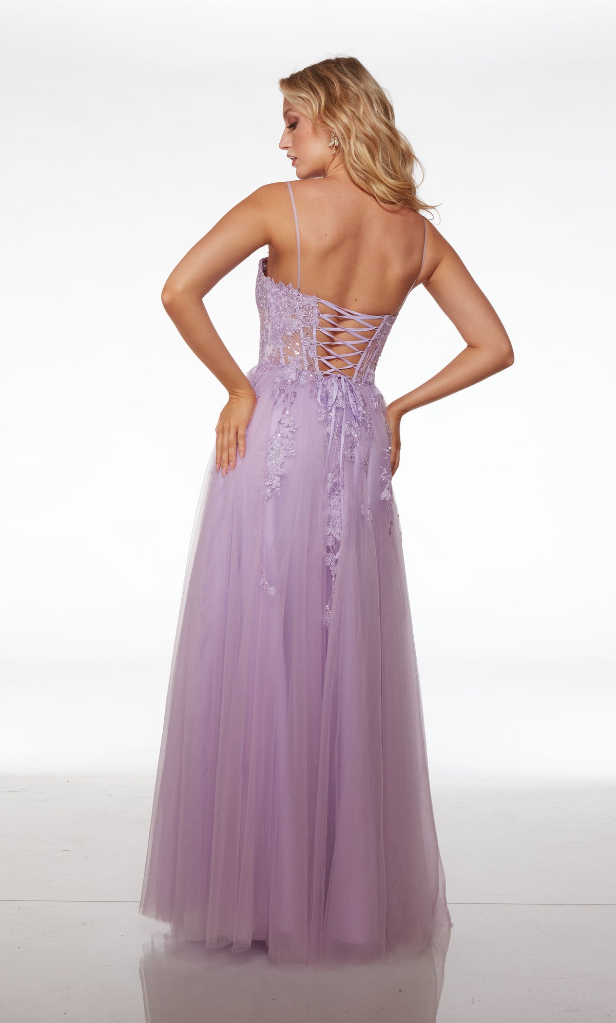 Purple dress featuring an sheer floral lace bodice and an crisscross lace-up back for an timeless and elegant aesthetic.