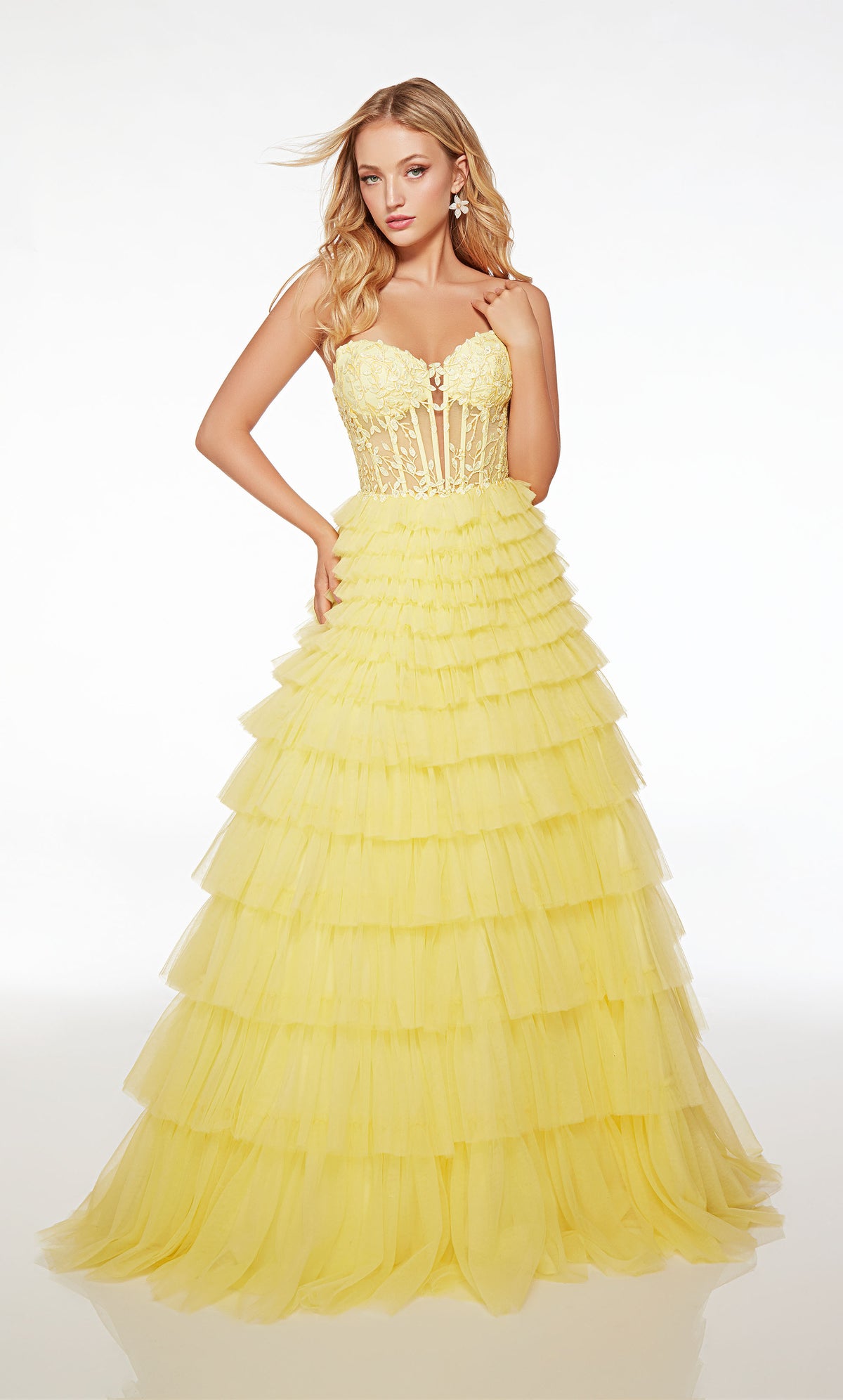 Dreamy yellow prom dress with an sheer lace strapless corset top and an tiered tulle skirt for an romantic and enchanting look.