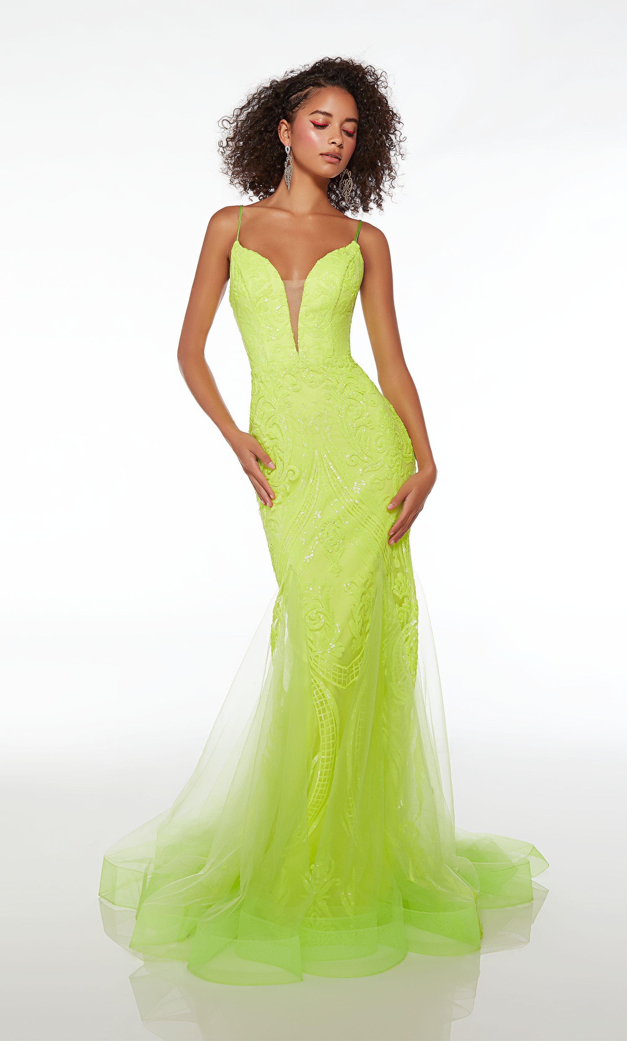 Fitted plunging green prom dress with an lace-up back, fit-and-flare tulle skirt, and paisley sequin design throughout for an stylish and captivating look.