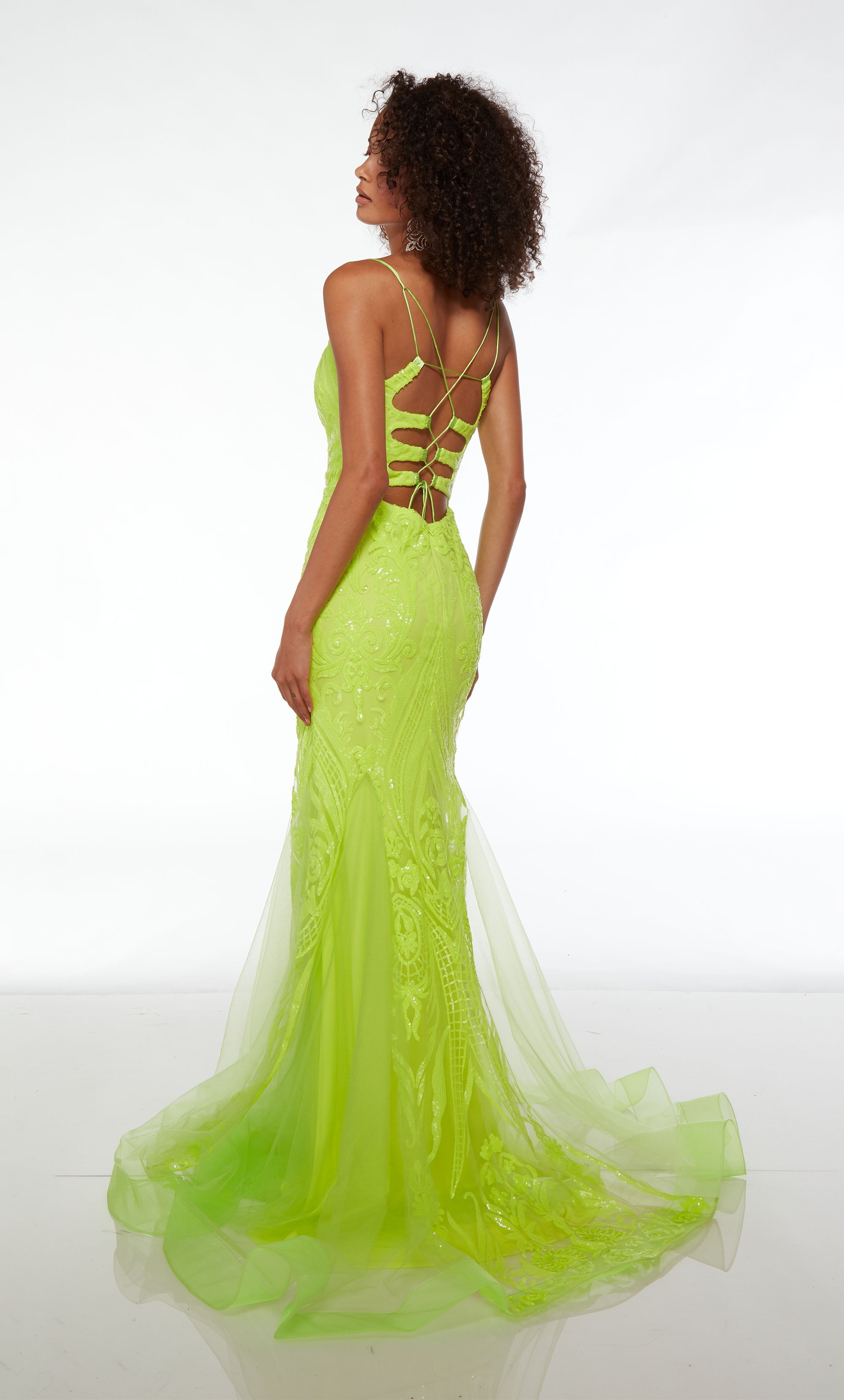 Fitted plunging green prom dress with an lace-up back, fit-and-flare tulle skirt, and paisley sequin design throughout for an stylish and captivating look.