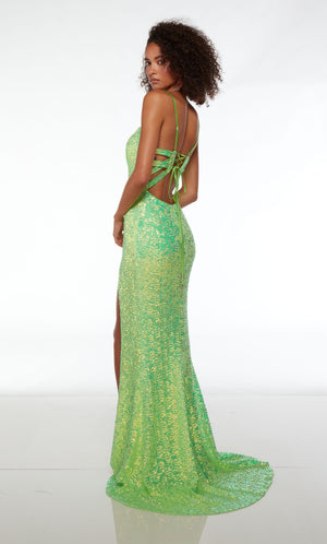 Green prom dress: form-fitting, plunging neckline, high slit, spaghetti straps, strappy open back, and an slight train in iridescent sequins.