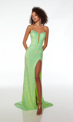 Green prom dress: form-fitting, plunging neckline, high slit, spaghetti straps, strappy open back, and an slight train in iridescent sequins.
