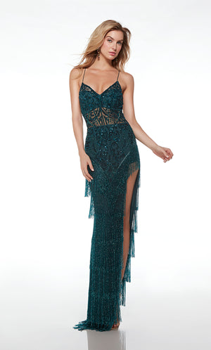 Breathtaking green fringe formal dress with an V neckline, sheer bodice, high slit, crisscross lace-up back, and intricate sequin detail for an stunning and stylish look.