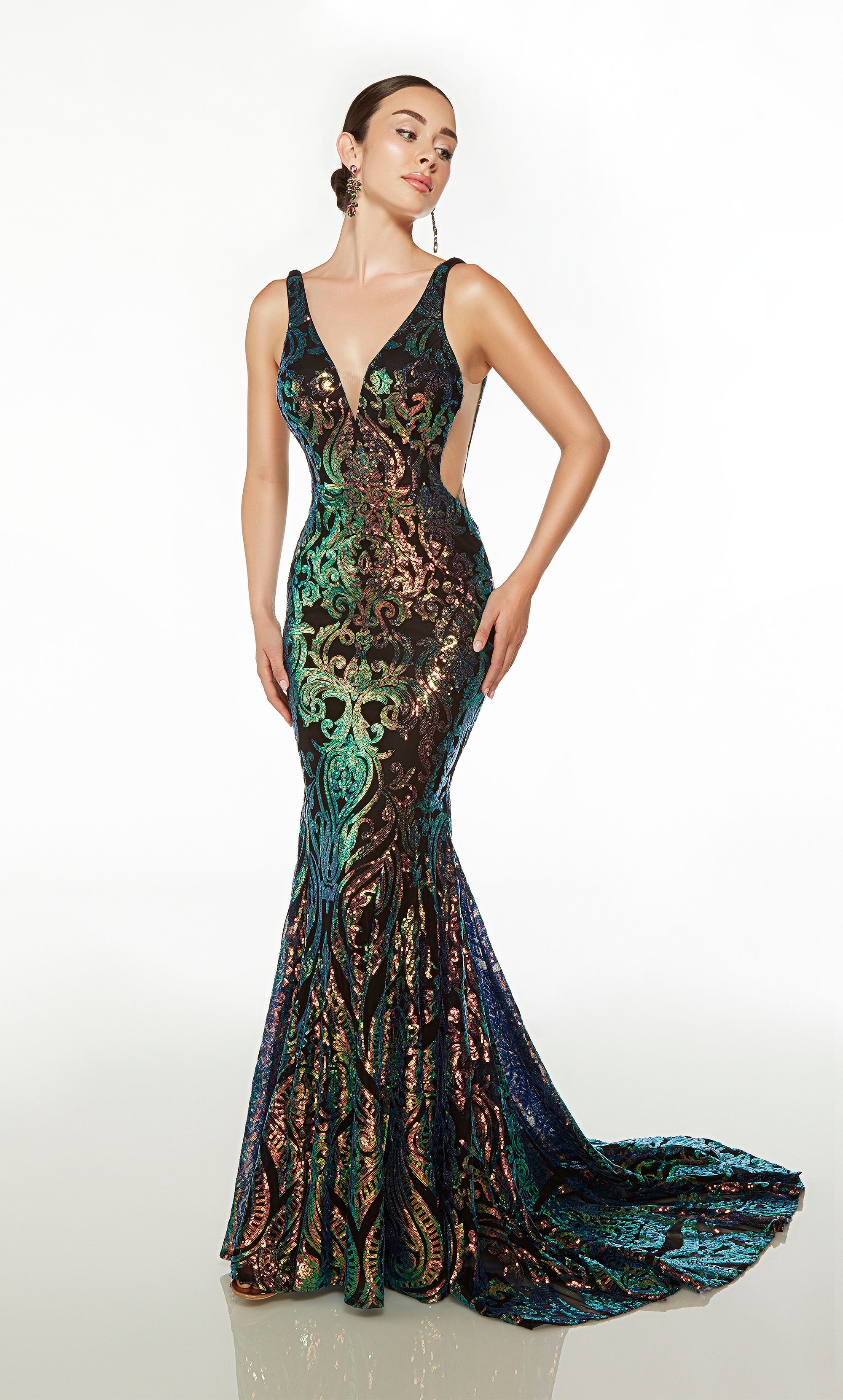 Elegant black mermaid gown: Plunging neckline, illusion side cutouts, fitted bodice, open V-shaped back, long train, paisley-patterned iridescent sequins.