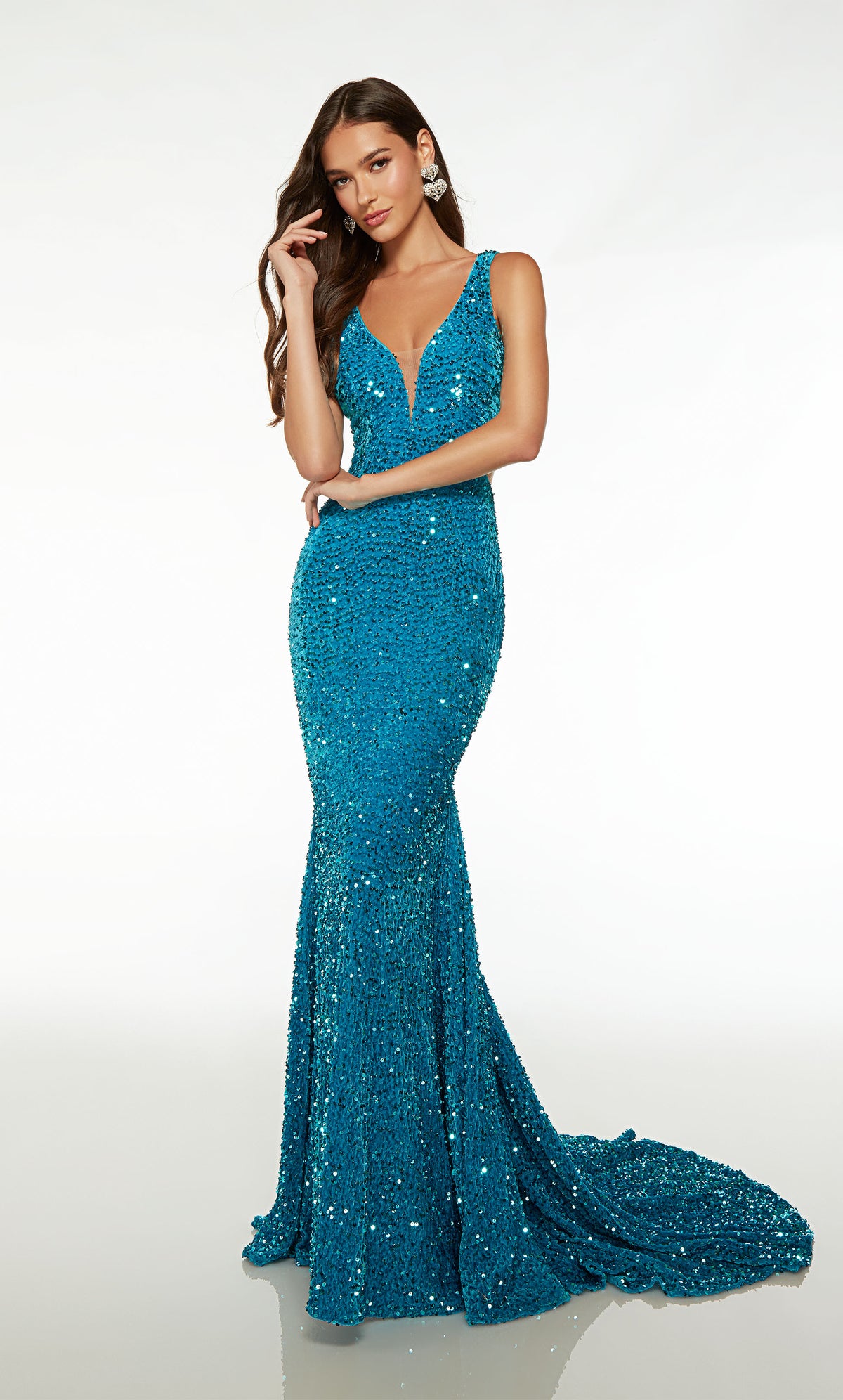 Gorgeous fit-and-flare designer dress in ocean blue plush sequins: plunging neckline, illusion side cutouts, V-shaped open back, and train.
