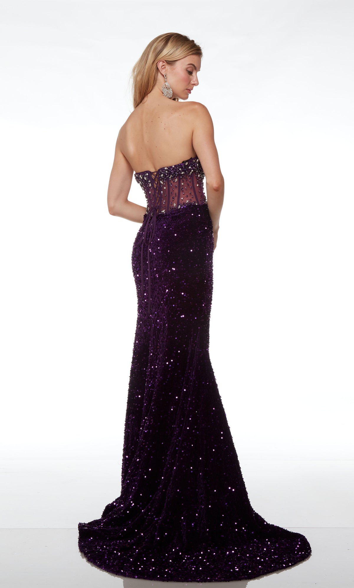 Fully embellished purple dress: strapless sheer corset bodice, high slit, lace-up back, and train for an glamorous and stylish look.