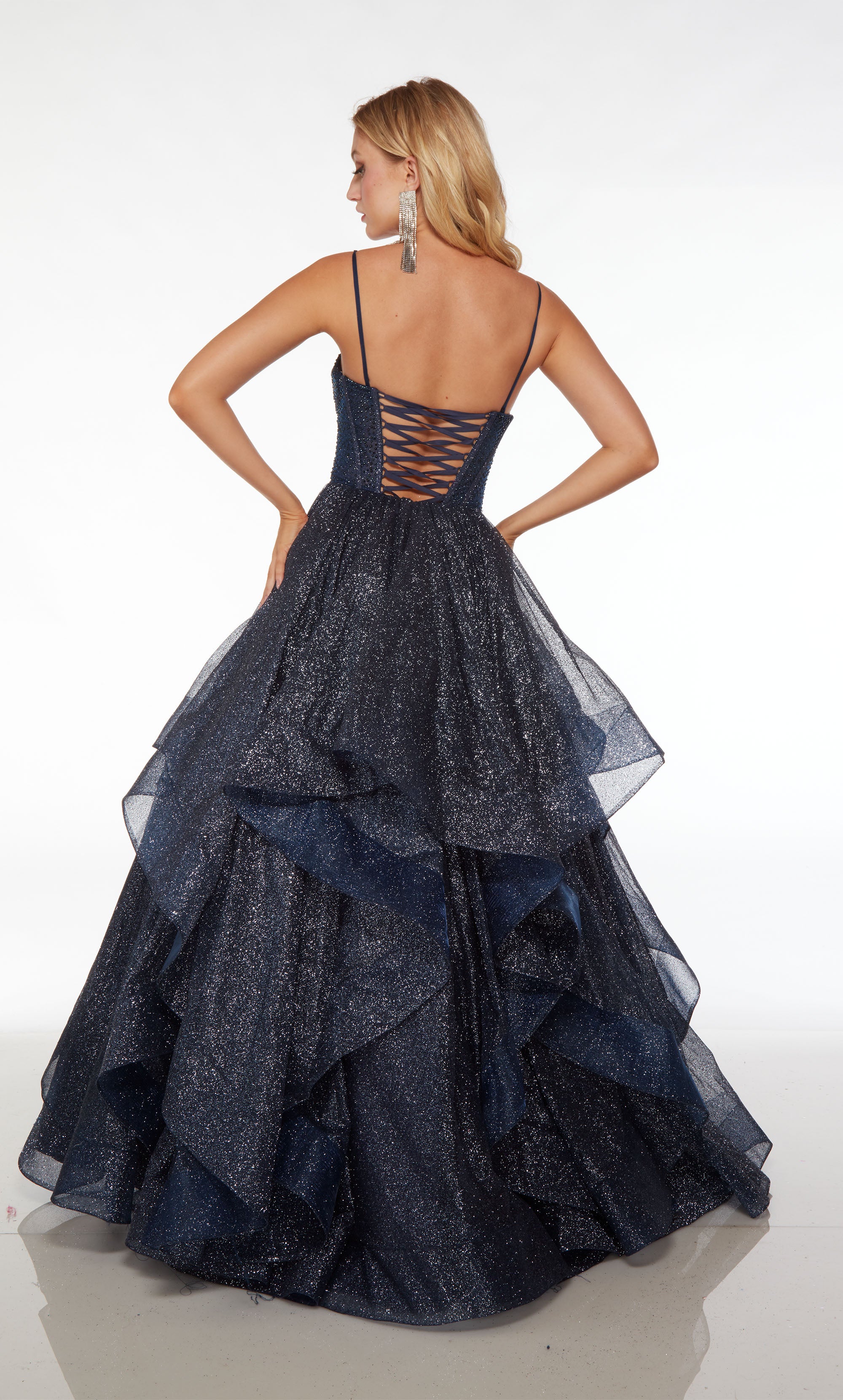 Midnight blue glitter tulle ball gown: hotfix embellished corset bodice, ruffled skirt, lace-up back for the perfect custom fit and elegant allure.