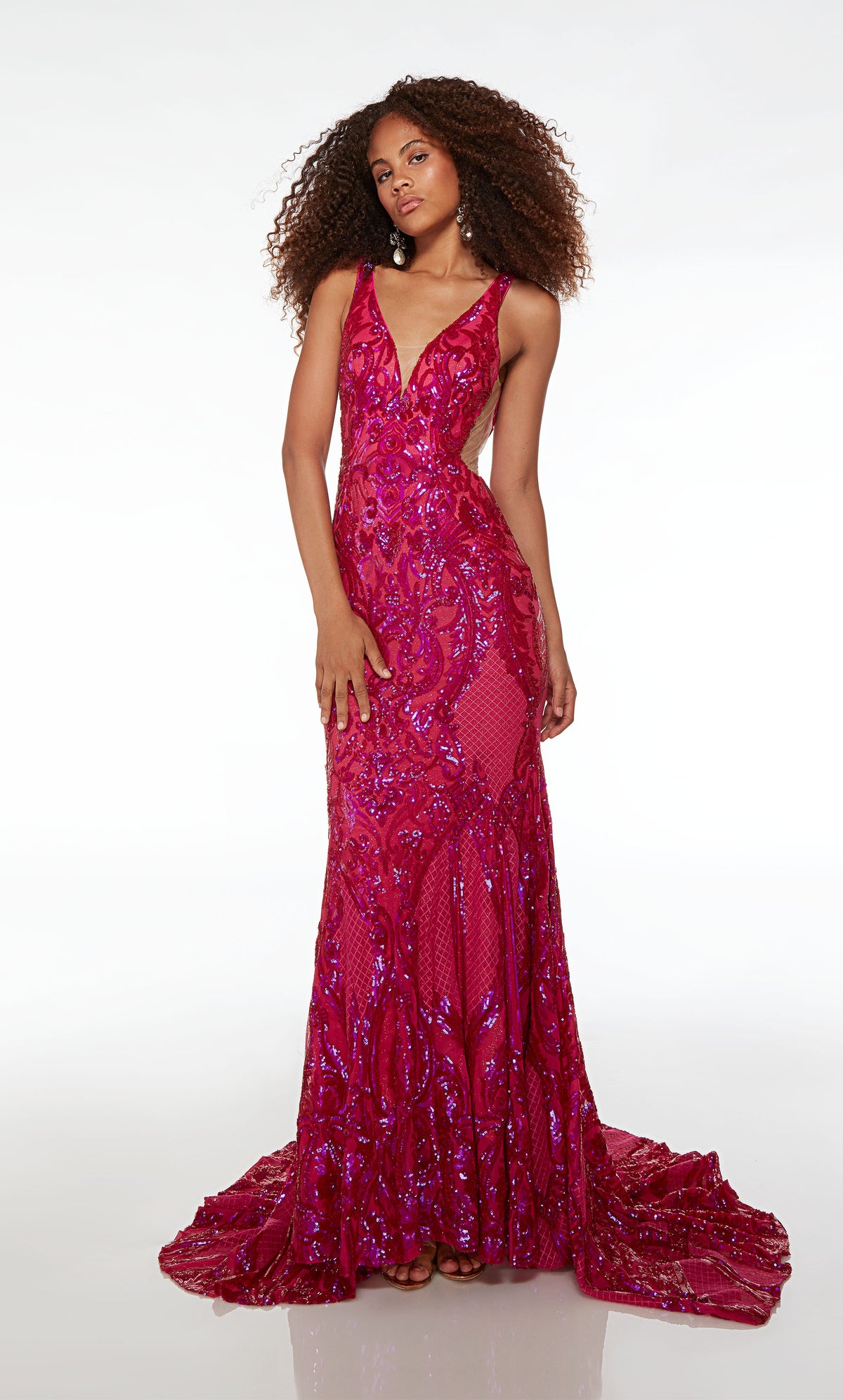Raspberry pink formal dress: plunging neckline, illusion cutouts, paisley-patterned iridescent sequins, V-shaped back, and graceful train.
