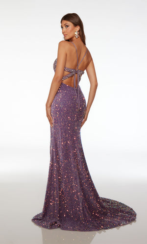 Fitted iridescent purple sequin dress with sweetheart neckline, rhinestone embellished bust, high slit, crisscross lace-up back, and an stunning train.