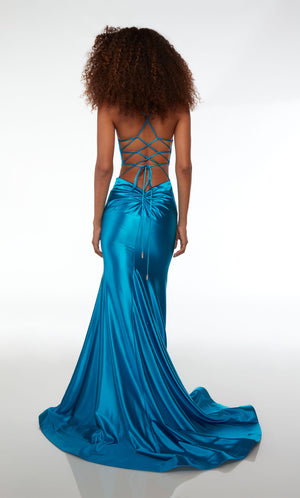 Form fitting ocean blue formal dress in an mermaid silhouette, V neckline, side cutouts, lace-up back, ruching detail, and an long glamorous train.
