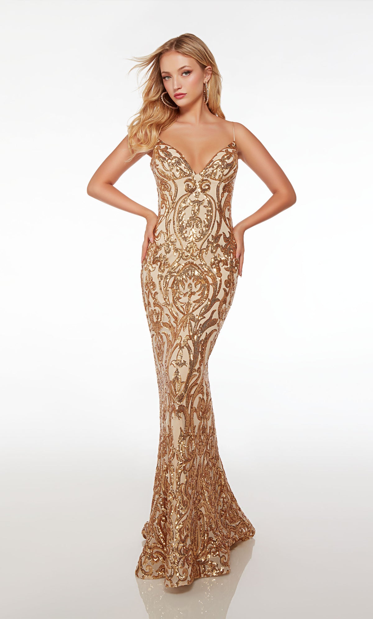 Fit-and-flare gold prom dress with V neckline, dual spaghetti straps, lace-up back, and an train, featuring an gorgeous paisley-patterned design.