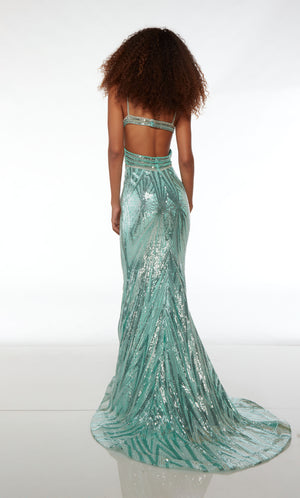 Sparkly blue mermaid dress with an butterfly-inspired bodice, strappy open back, train, and an stunning sequin design for an enchanting look.
