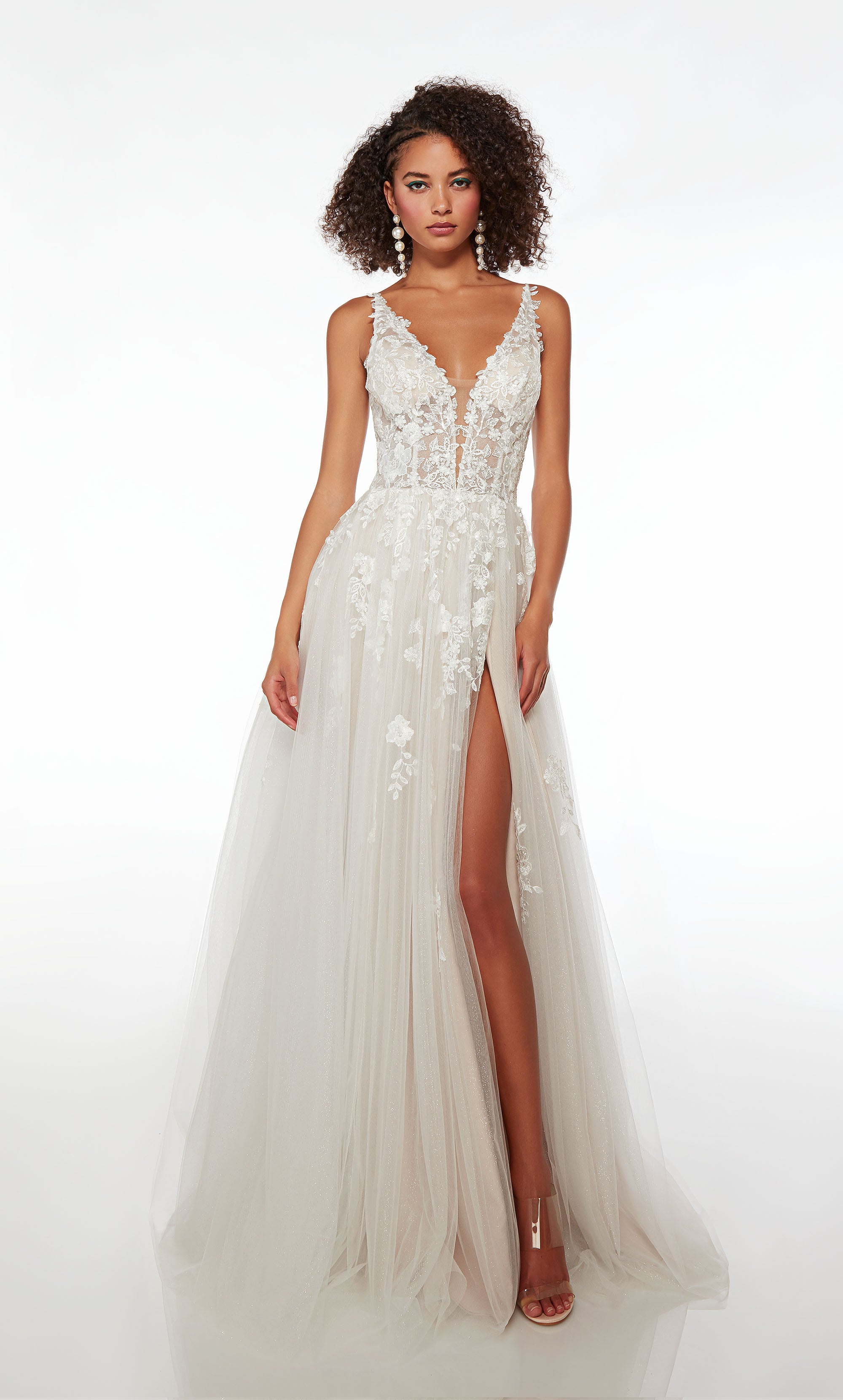 Charming boho chic white prom dress with light latte-colored lining, adorned with floral lace and glitter tulle fabric for an romantic and whimsical look.