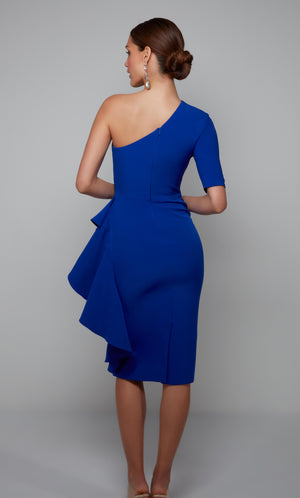 One shoulder cocktail dress with a zip up back, back slit, and side ruffle in cobalt blue.