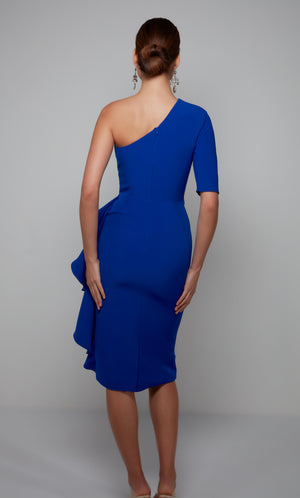 One shoulder midi dress with a zip up back, back slit, and side ruffle in cobalt blue.