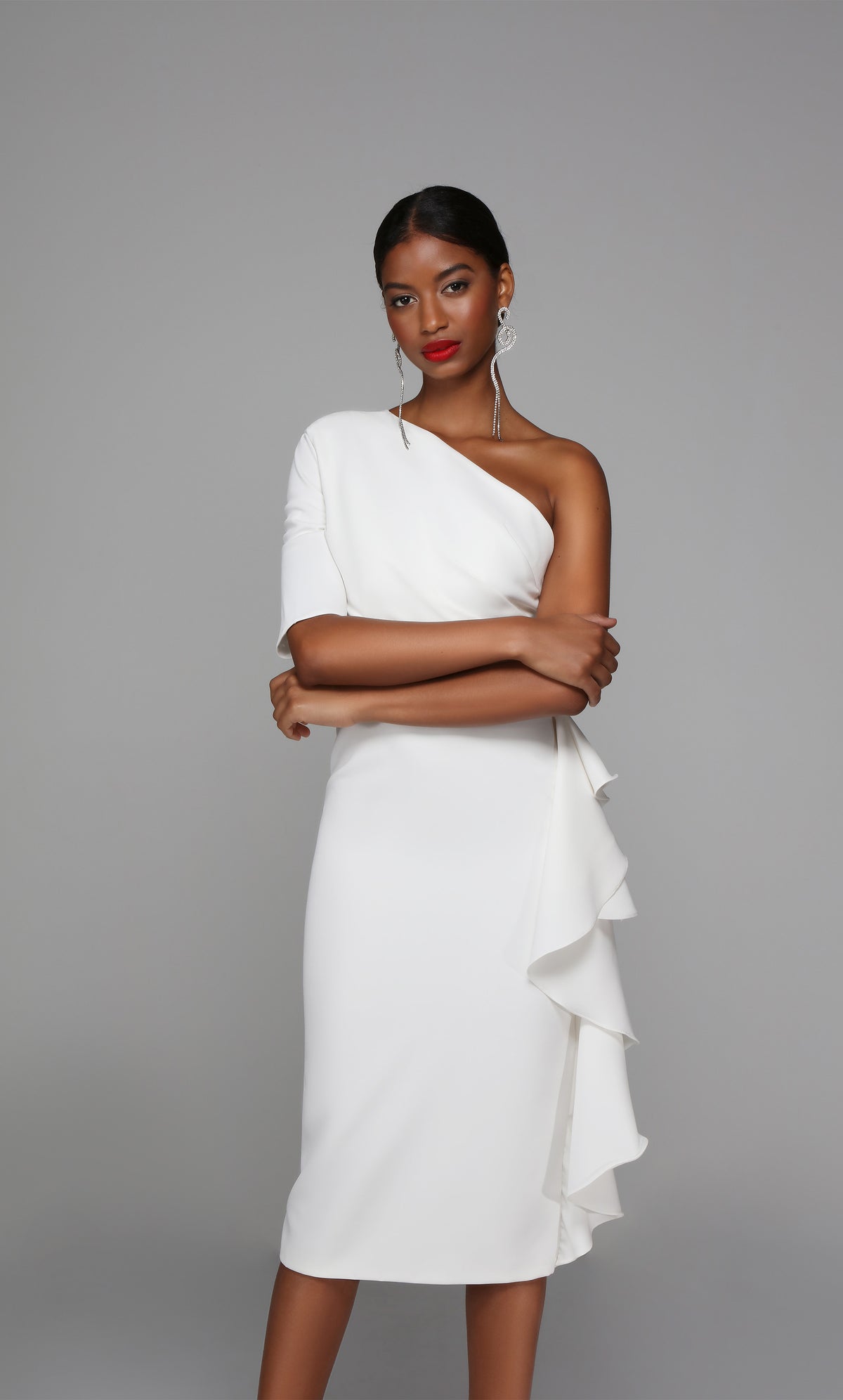 One shoulder midi dress with ruched bodice and side ruffle in white.