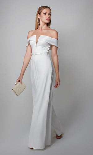 White engagement jumpsuit with an elegant off the shoulder neckline and matching belt at the natural waist. Color-SWATCH_70012__DIAMOND-WHITE