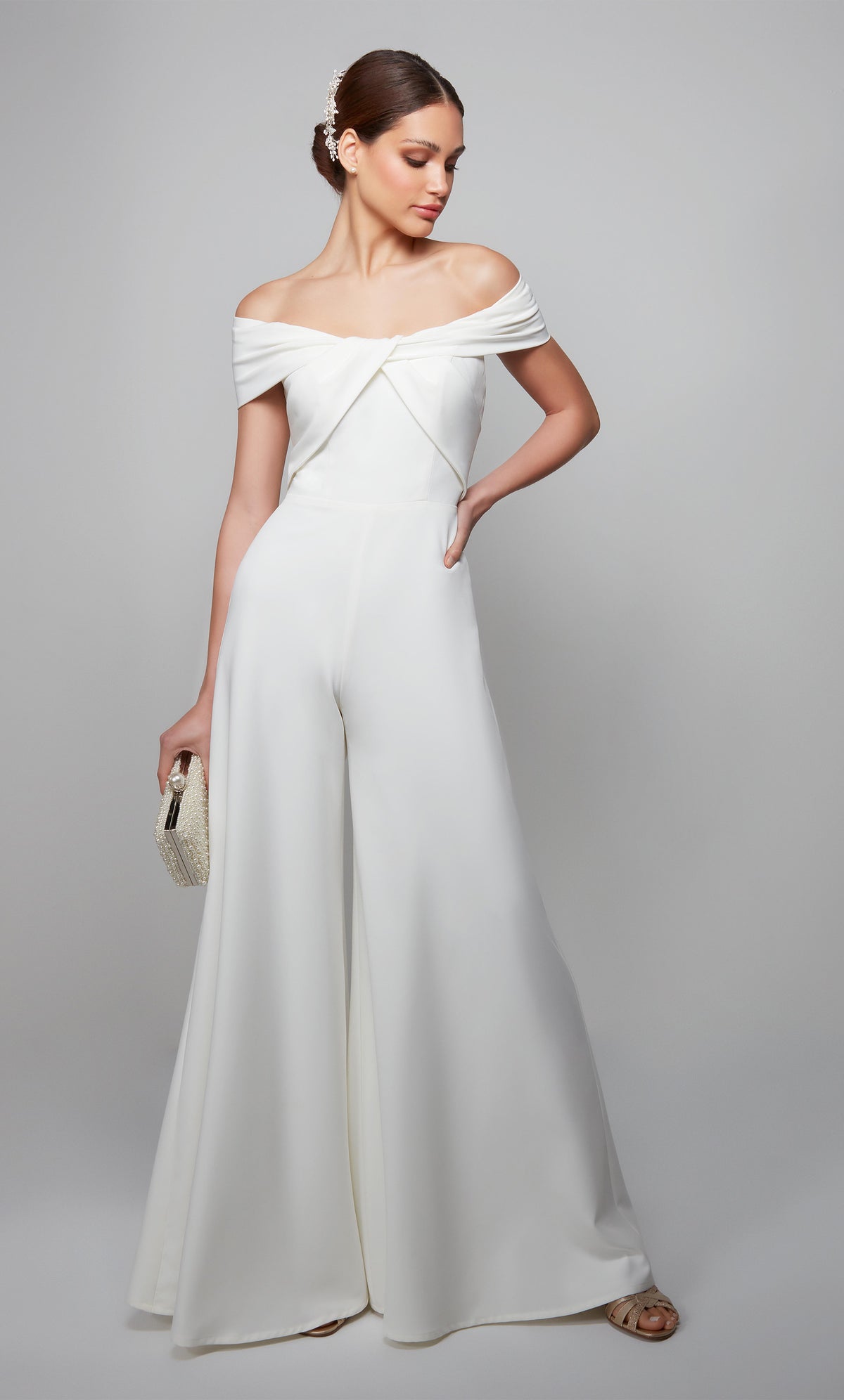 Ivory wide leg jumpsuit with an off the shoulder neckline. Color-SWATCH_70013__IVORY