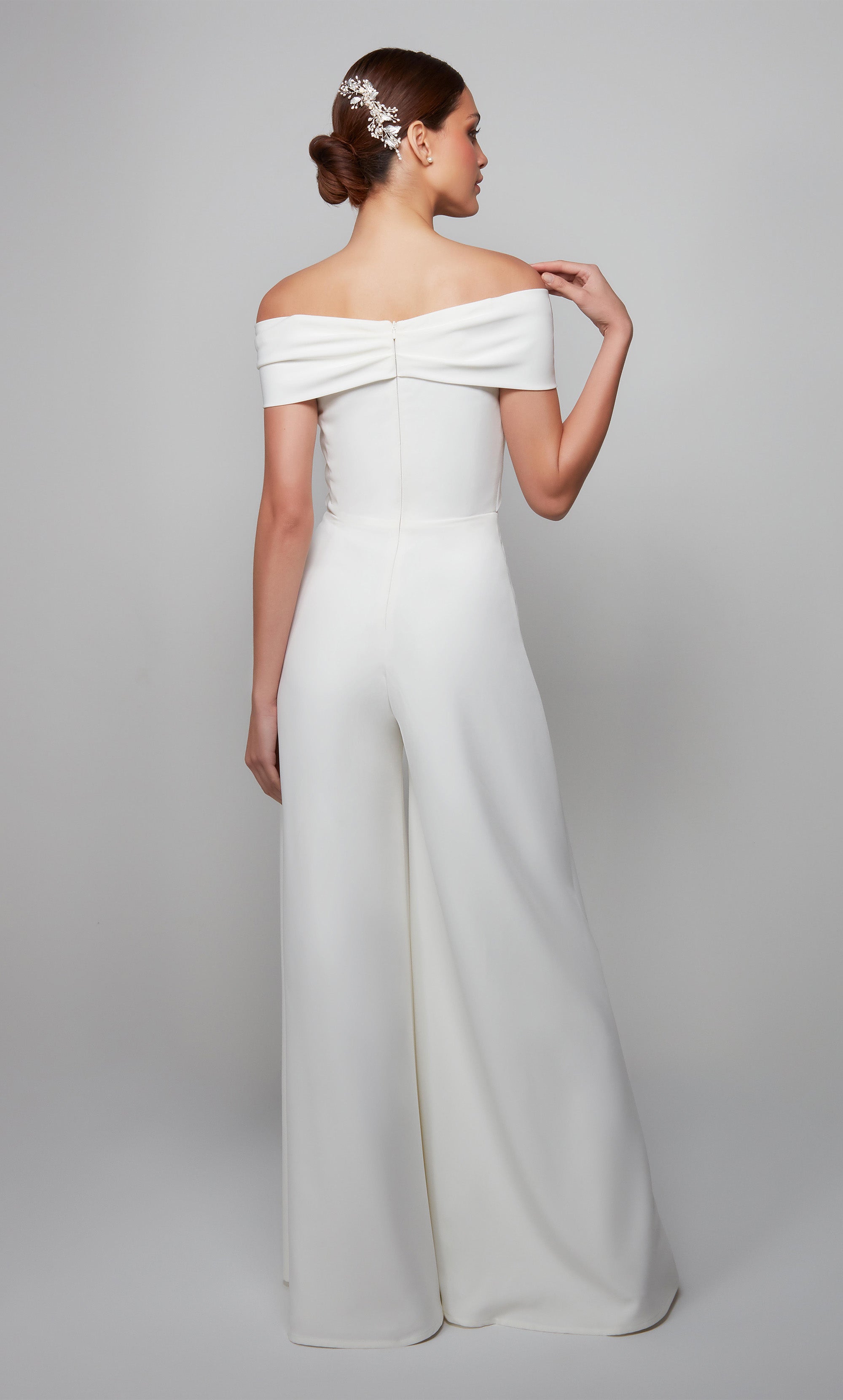 Ivory wide leg jumpsuit with an off the shoulder neckline. Color-SWATCH_70013__IVORY