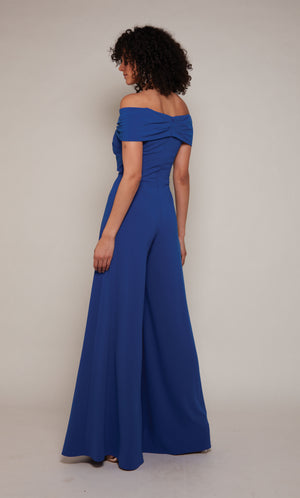 Royal blue wide leg jumpsuit with an off the shoulder neckline and closed zipper back.